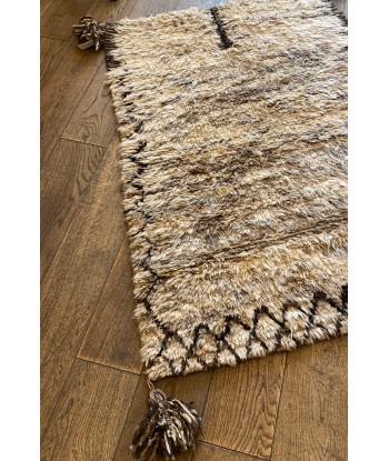 Tapis en laine 3 rembourrage situé sous