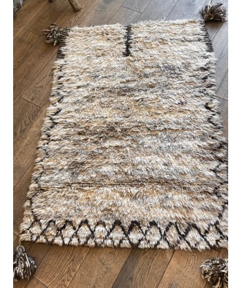 Tapis en laine 3 rembourrage situé sous